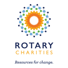 Logo for Rotary Charities with orange gear-like circles in the middle and interconnected blue and green dots on the outer circle